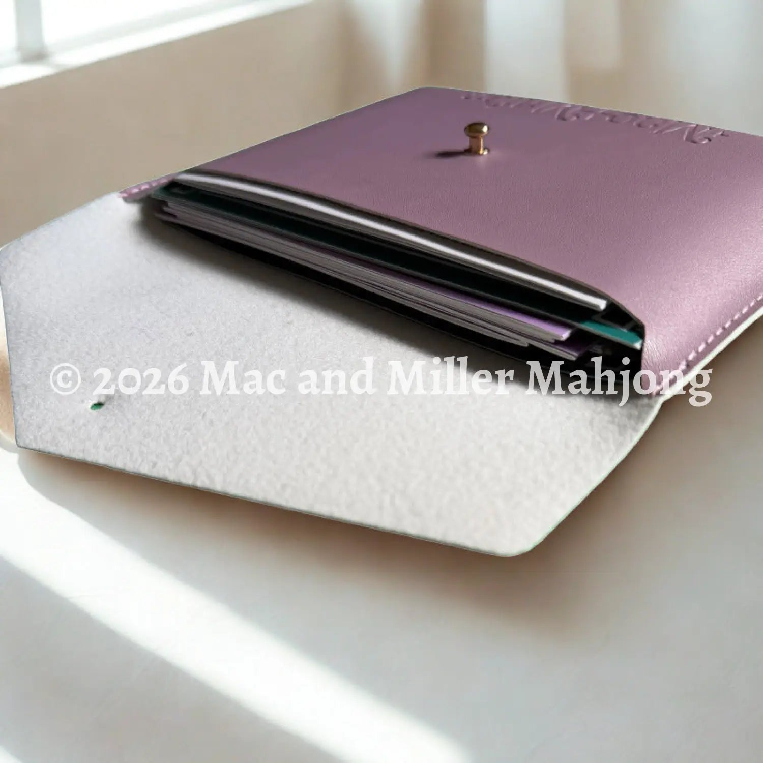 Lavender card clutch with logo embossed 