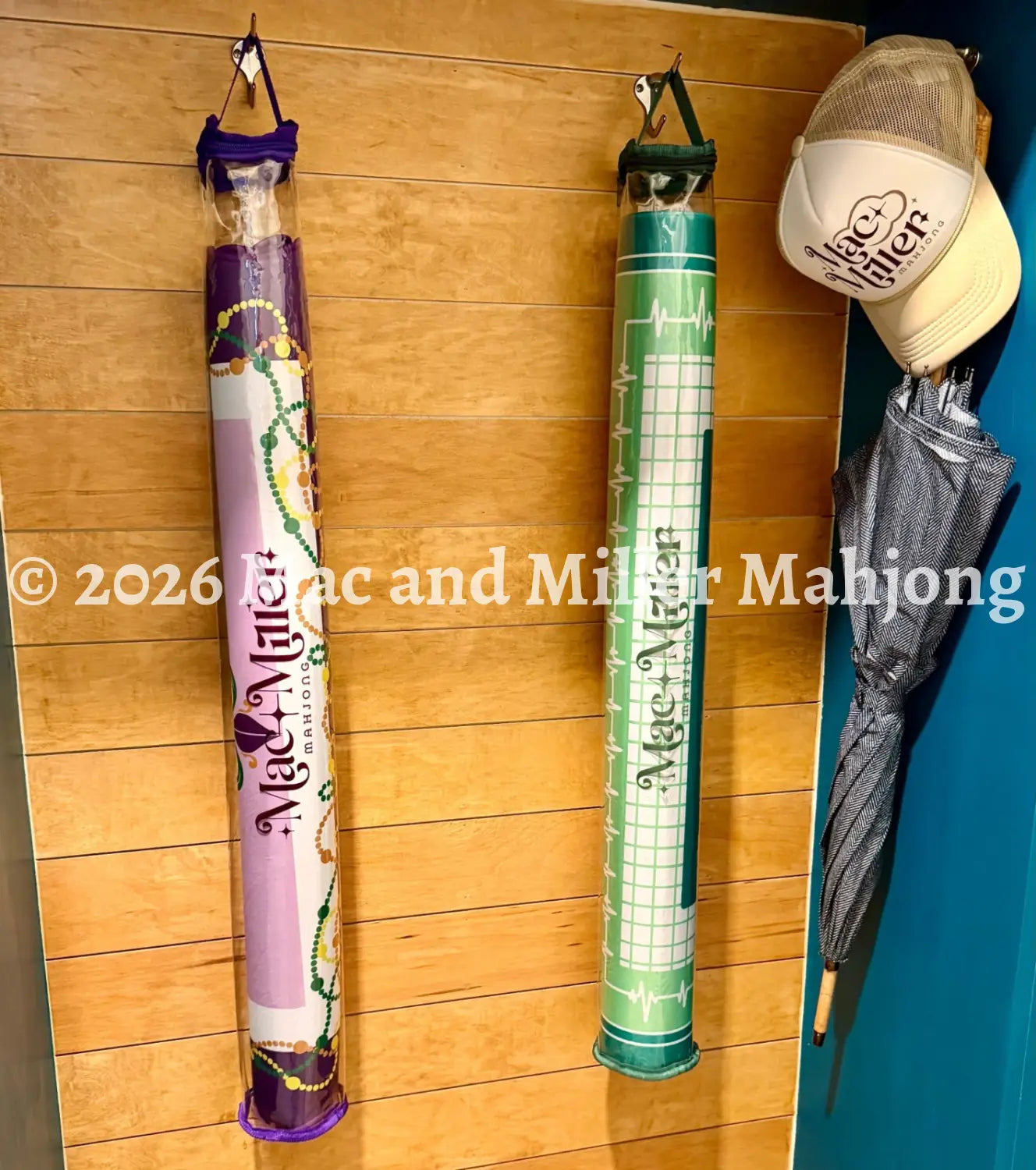 Mac and Miller Mahjong Dream Display tote in moss and plum hanging storage in mudroom